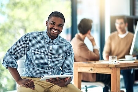 Tablet, happy and portrait of black man in office with leadership, confidence and pride for career. 