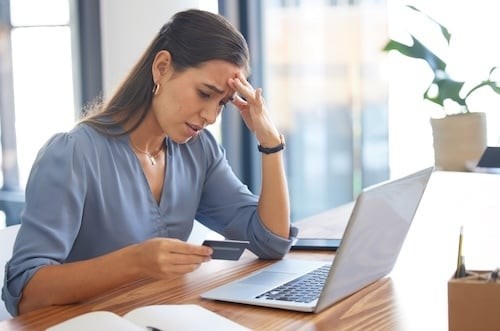 Credit card, stress or business woman with anxiety from banking fraud, financial problem or ecommerce scam. Password error, bankruptcy or sad worker frustrated with declined online payment or deb