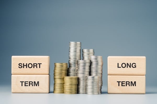 Short term and long term financing concept, investment decision, loans, and debt benefits