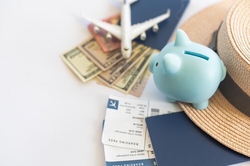 Save money for airplane tickets, planning travel budget concept