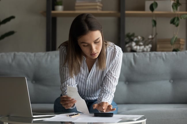 woman filling out personal loan application