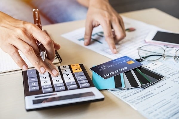 Personal Loan vs. Credit Card Debt: Interest, Payment, Payoff